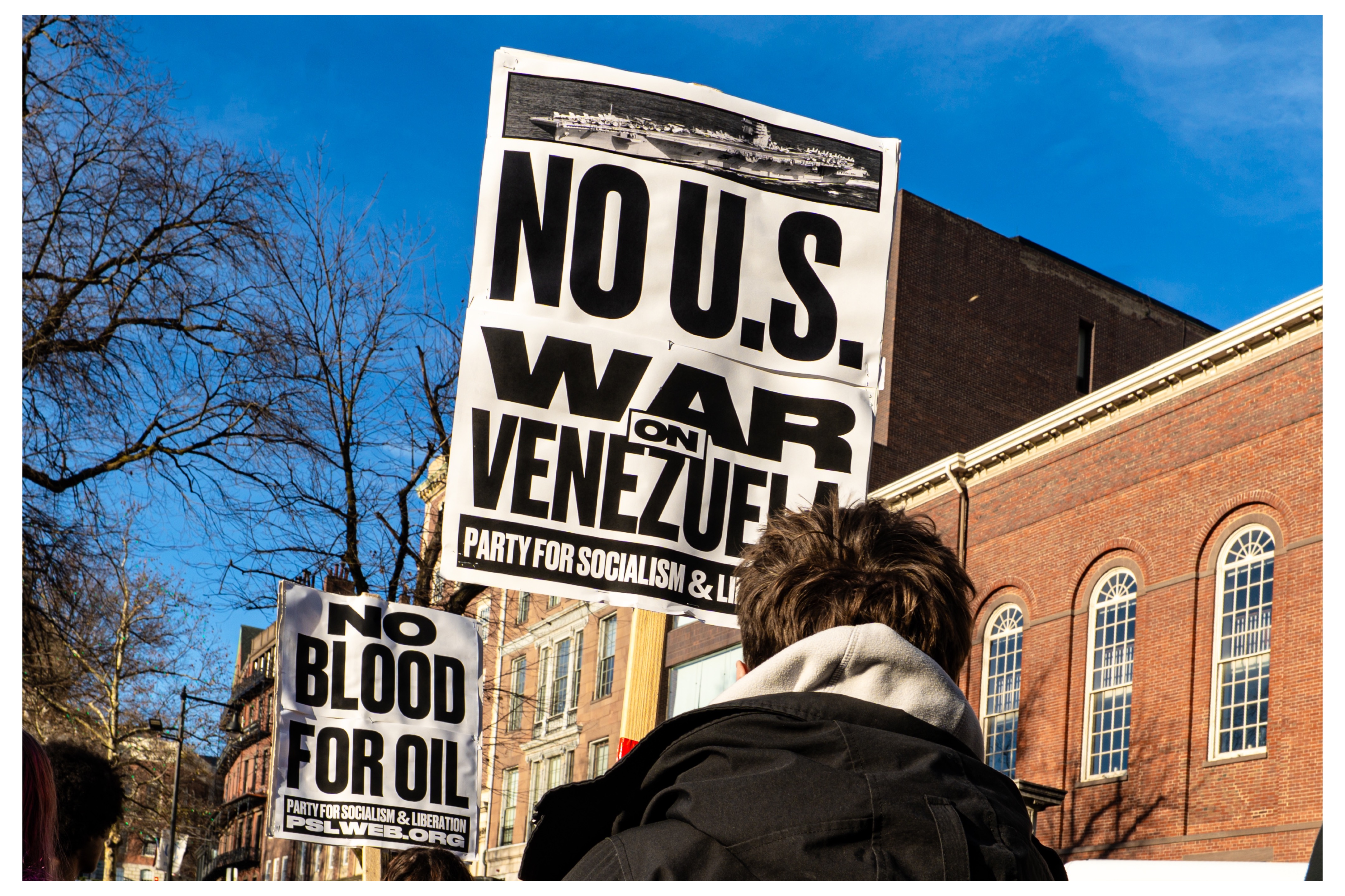 A brief protest against military invasion in Venezuela on the Boston Common 12/6/25